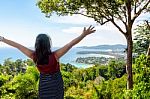 Woman Tourist Happy Gestures On High Scenic View Stock Photo