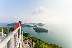 Woman Tourist On Peak Viewpoint Of Island Stock Photo