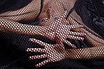 Woman Traped In Black Fishnet Stock Photo