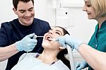 Woman Under Dental Treatment Stock Photo