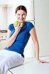 Woman With Apple Stock Photo