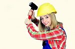 Woman With Hammer Stock Photo