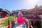 Woman With Hanbok In Gyeongbokgung,the Traditional Korean Dress Stock Photo