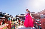 Woman With Hanbok In Gyeongbokgung,the Traditional Korean Dress Stock Photo