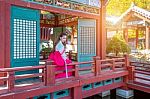 Woman With Hanbok In Gyeongbokgung,the Traditional Korean Dress Stock Photo