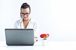 Woman With Laptop Working At Home Stock Photo