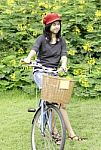 Woman With Retro Bicycle In A Park Stock Photo