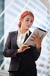 Woman With Tablet At Modern City Stock Photo