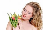 Woman With Tulips Stock Photo