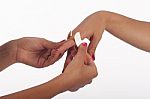 Woman's Hand With Plaster Stock Photo