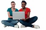 Women Browsing On Laptop Stock Photo