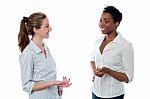 Women Discussing Something Casually Stock Photo