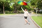 Women Holding Umbrella Stock Photo