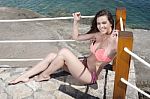 Women On The Beach In Bikini Stock Photo