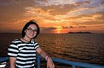 Women Tourist Cruising At Sunset Stock Photo