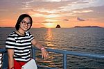 Women Tourist Cruising At Sunset Stock Photo