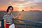 Women Tourist Cruising At Sunset Stock Photo