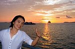 Women Tourist Cruising At Sunset Stock Photo