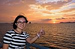 Women Tourist Cruising At Sunset Stock Photo