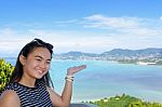 Women Tourist Inviting To See Of The Sea In Phuket Province, Tha Stock Photo