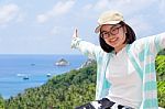 Women Tourists Extend The Arms Happily Stock Photo