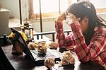 Women With Stressful On The Table Stock Photo