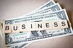 Wooden Block Word Business And Dollar Banknote Stock Photo