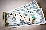 Wooden Block Word Money And Dollar Banknote Stock Photo