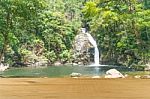 Wooden Board Empty Table In Front Of Blurred Waterfall Backgroun Stock Photo