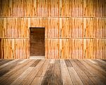 Wooden Wall With Door And Wood Floor In Front Off Stock Photo