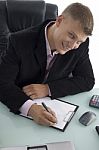 Working Handsome Businessman Stock Photo