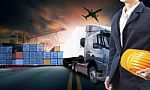 Working Man And Container Truck ,ship In Port And Freight Cargo Plane In Transport And Import-export Commercial Logistic ,shipping Business Industry Stock Photo