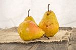 Yellow Pear On A Table Stock Photo