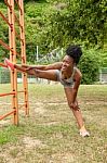 Young African Woman Doing Stretching Stock Photo