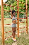 Young African Woman Doing Stretching Stock Photo