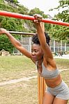 Young African Woman Doing Stretching Stock Photo