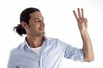 Young American Male With Counting Fingers Stock Photo