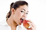 Young American Model Eating An Apple Stock Photo