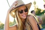 Young Attractive Woman With Hat On A Summer Day Stock Photo