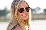 Young Attractive Woman With Sunglasses On A Summer Day Stock Photo