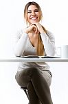 Young Beautiful Girl Reading News And Drinking Coffee. Isolated Stock Photo