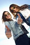 Young Beautiful Girls With Denim Suit In A Urban Background Stock Photo