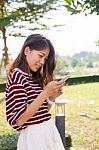 Young Beautiful Woman Connecting By Chat And Reading Message In Stock Photo