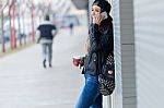 Young Beautiful Woman With Mobile Phone And Coffee Stock Photo