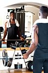 Young Bodybuilder Lifting The Barbell Stock Photo