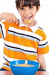 Young Boy Having His Breakfast Stock Photo