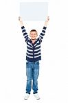 Young Boy Holding Blank Board Stock Photo