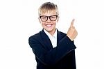 Young boy Pointing Upward Stock Photo