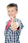 Young Boy Showing Thumbs Up Stock Photo