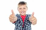 Young Boy Showing Thumbs Up Stock Photo